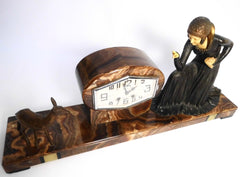 Art Deco Clock  approx. 1935 France  signed D. COSTAN  spelter and Ivorine figure group
