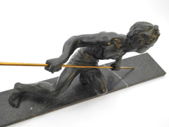 Art Deco Sculpture Hunter with Spear on a black&white Marble Base by Jean de Roncourt France 1920s. Beautiful fine detailed figure in Spelter with a verdigris patina.