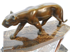 Bronze Panther Clock Set by Michel Decoux, France around 1910. Art Deco Cubist French Clock set with a 6 side Glass Clock case, mounted on a brown marble base with stepped chrome tubing.