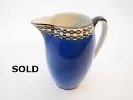 Blue Pitcher with Black & White Checkered pattern