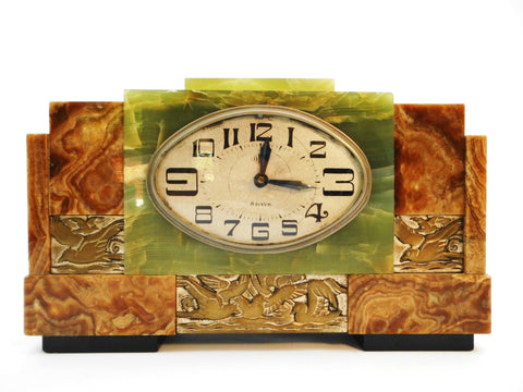 Exceptional French Art Deco marble 8-days Clock with green Onyx and Bronze Bas Relief plaques of Seagulls. 1920s. Currently fitted with a quartz movement.