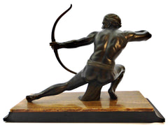 Large Male Archer Sculpture mounted on a marble base measuring 60 cm  23.62" long. Spelter with a beautiful bronze patina. Signed SALVATORE MELANI  1920-1930's.