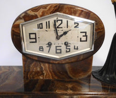 Art Deco Clock  approx. 1935 France  signed D. COSTAN  spelter and Ivorine figure group