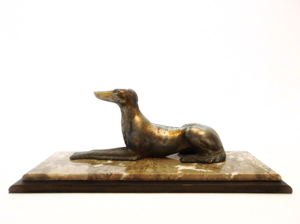 Elegant Borzoi Dog in Brass Alloy by Salvatore Melani (Italy 1902-1934). Mounted on a Two-layer Base of Iron & Marble. France 1920s.