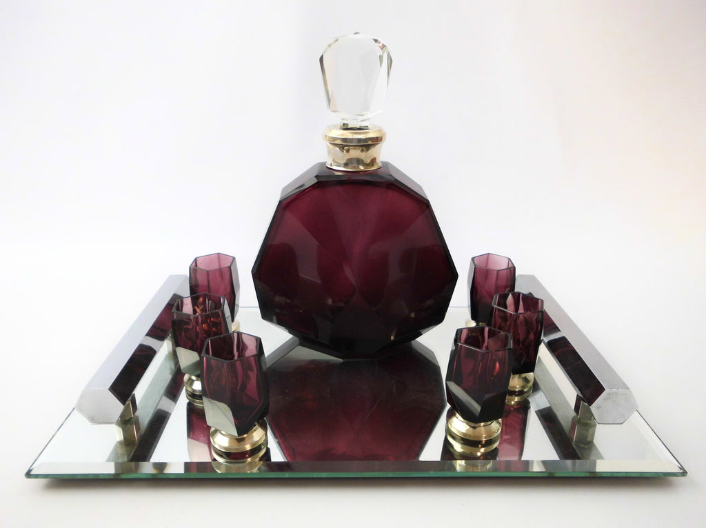Crystal amethyst Decanter & six Glasses set Val St. Lambert Belgium, model Nungesser 1927. Presented on a Mirror bottomed Tray with two handles.